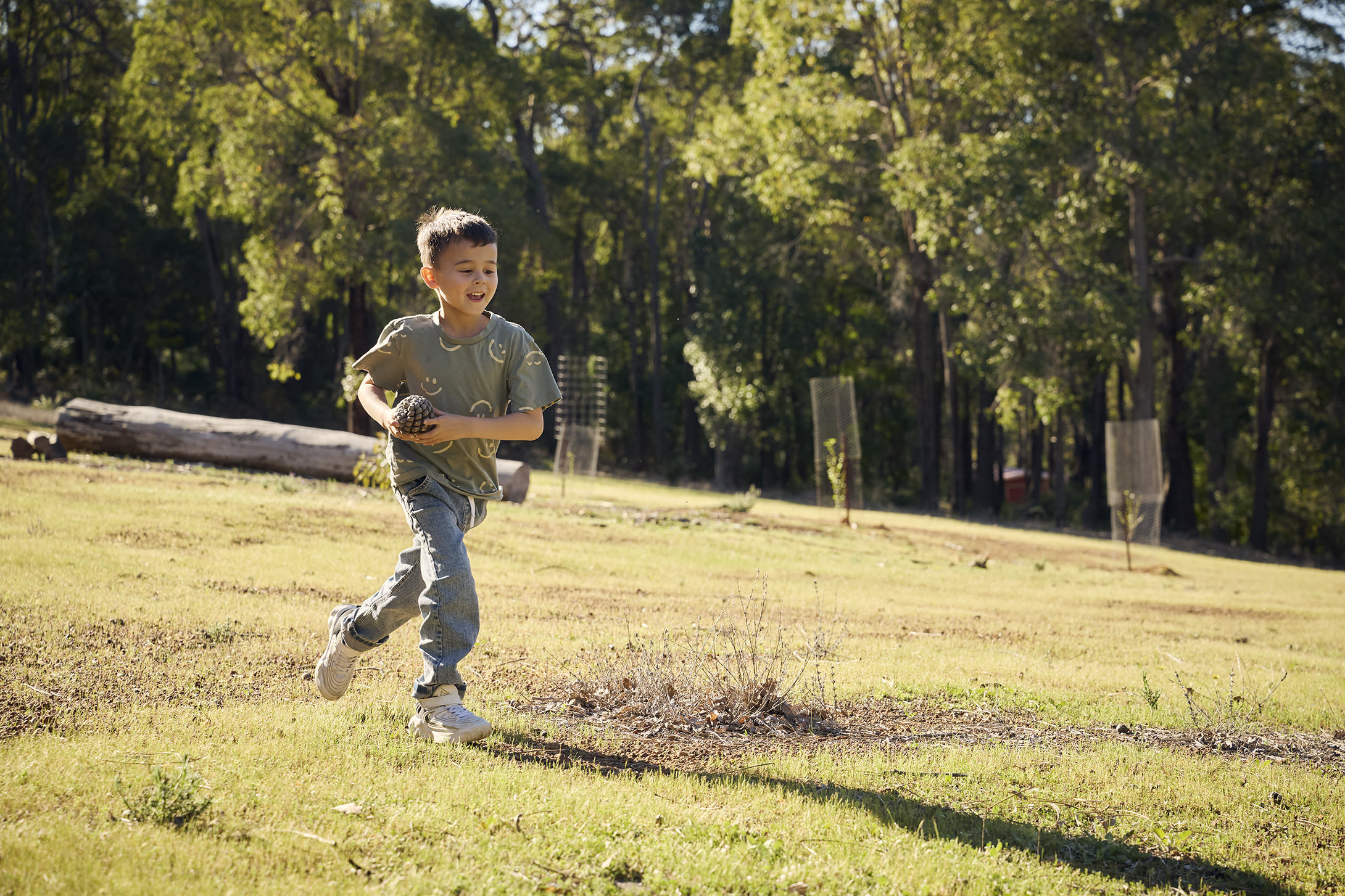 Boy running in park